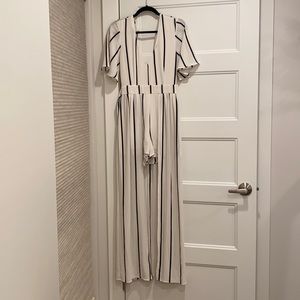 Fun black and white romper with cape